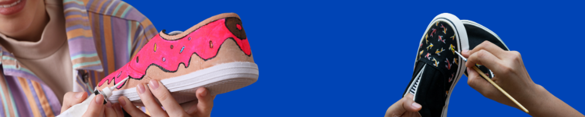 Individuals painting shoes
